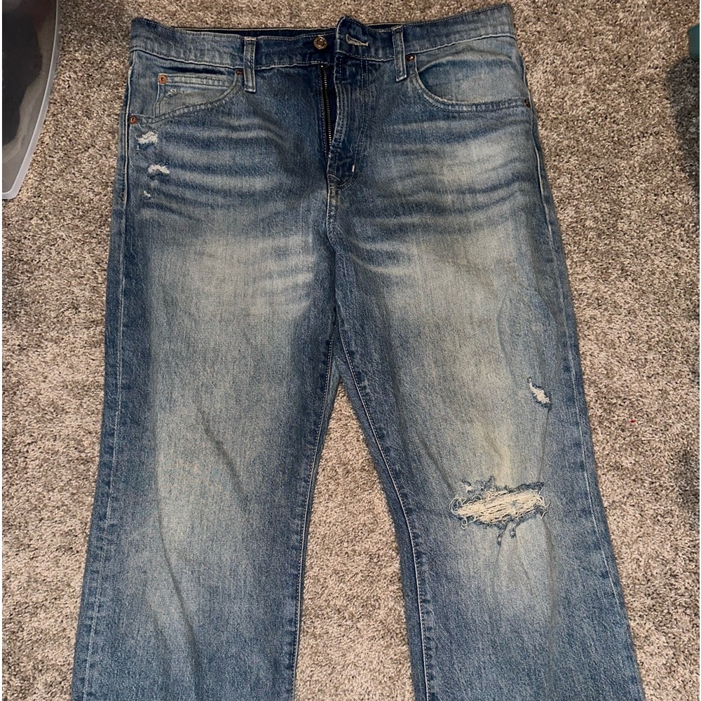 Gap denim brand jeans, size 10, a light blue, a little worn in the middle